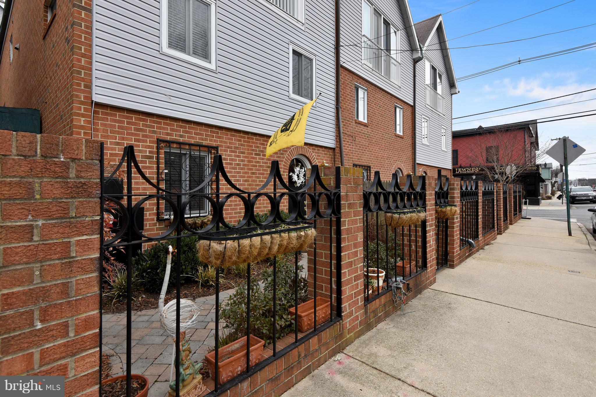 309 Fourth Street Annapolis, MD 21403 - Photo 1 of 30 a view of a house with wooden fence