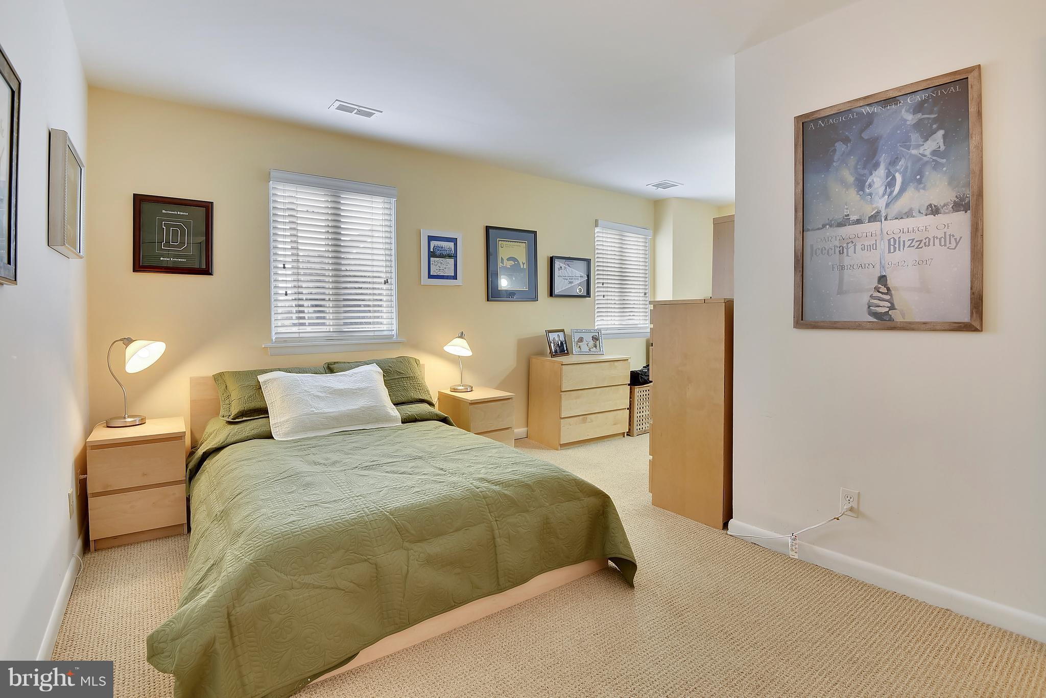 309 Fourth Street Annapolis, MD 21403 - Photo 14 of 30 a bedroom with a bed and a desk