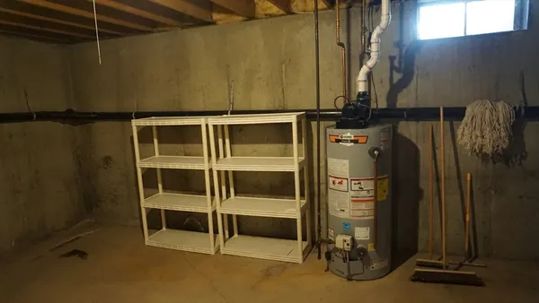 a view of a wooden door and a yard