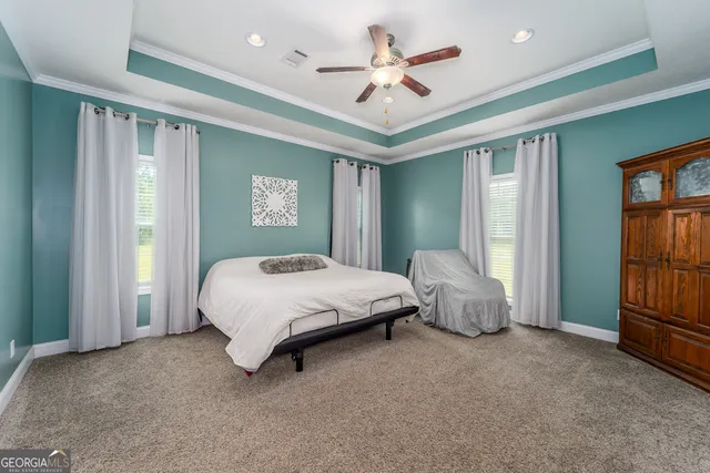 a kitchen with a sink and a refrigerator