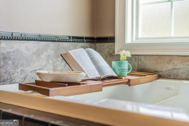 a kitchen with a sink and refrigerator
