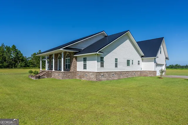 a view of a house with a garage