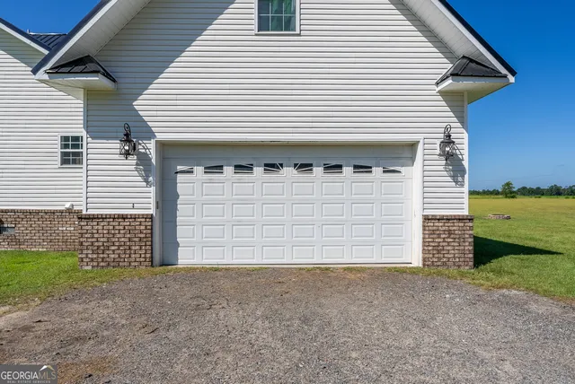 a view of a house with swimming pool yard and porch