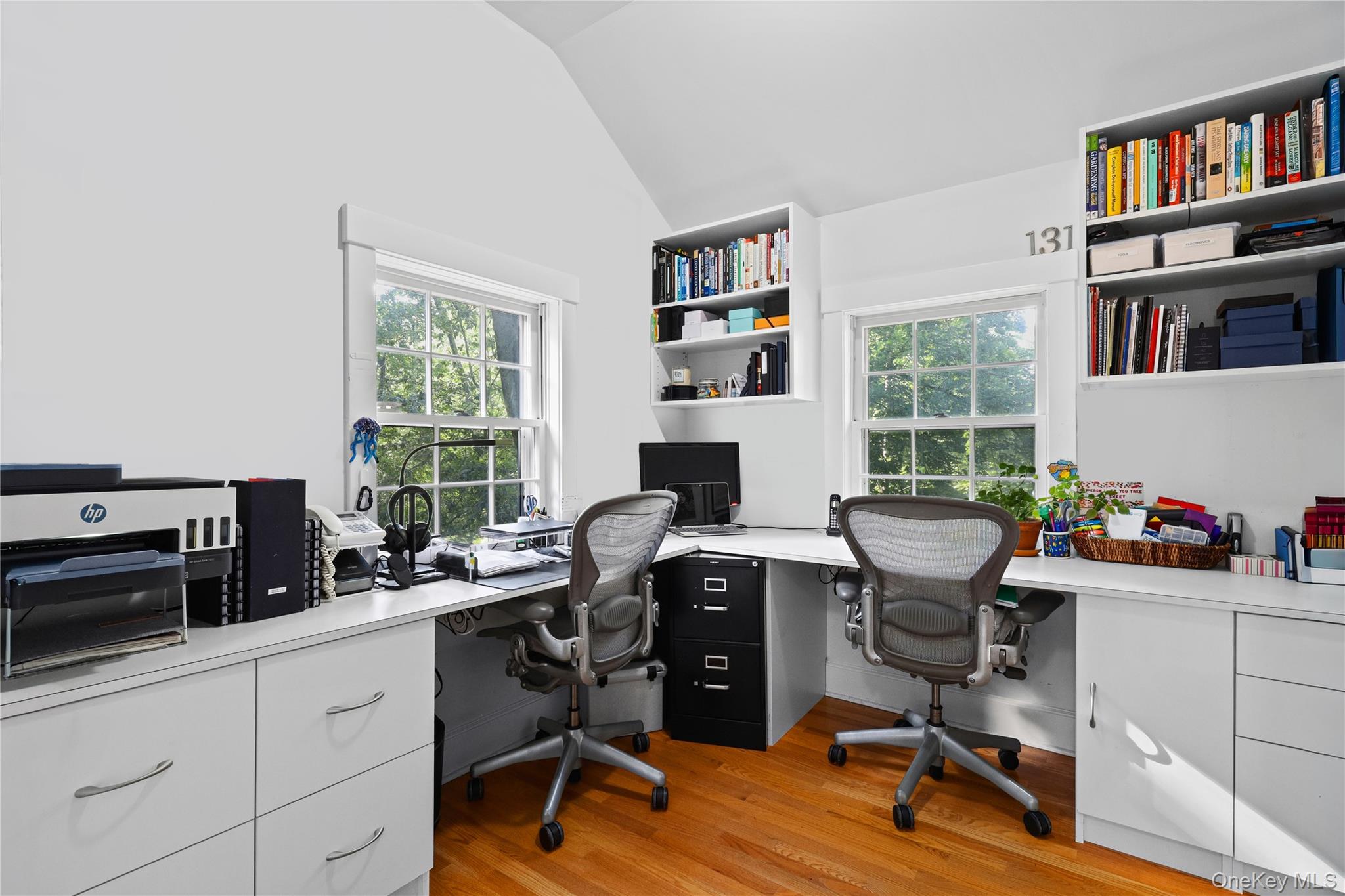 131 Douglas Road Chappaqua, NY 10514 - Photo 15 of 26 a view of a workspace with furniture and a window
