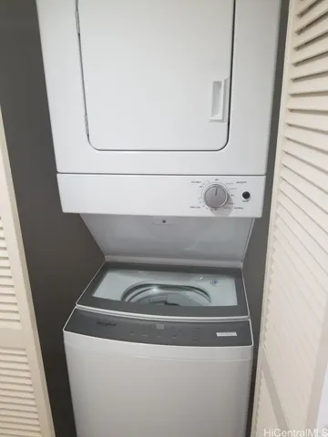 a bathroom with a bathtub shower sink vanity and a toilet