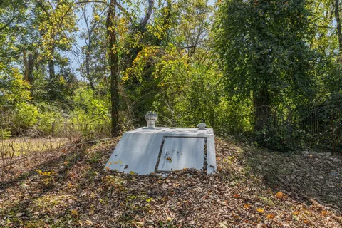 a bathroom with a sink vanity and a toilet