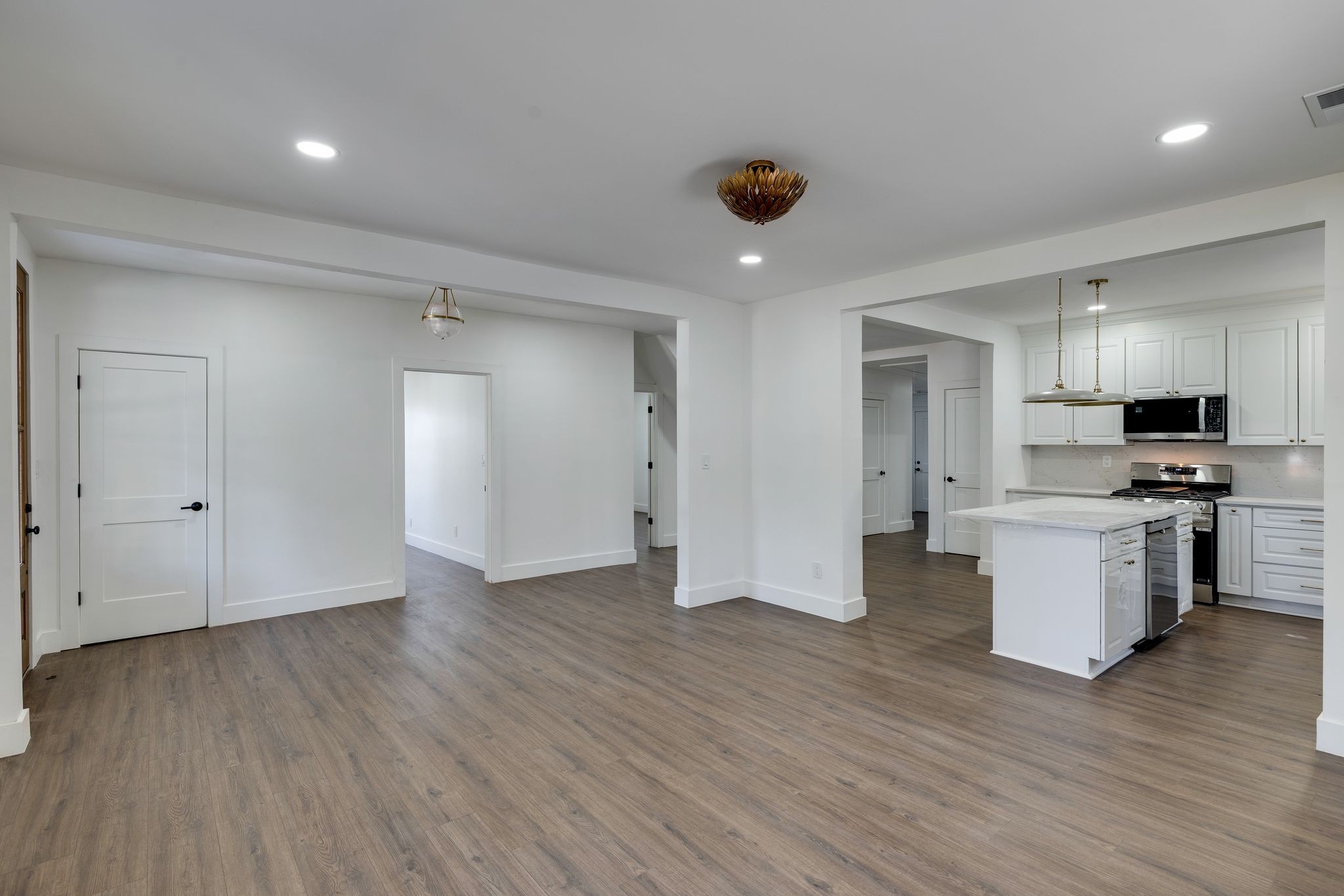 931 Glass Street Franklin, TN 37064 - Photo 5 of 31 a view of kitchen with stainless steel appliances granite countertop a refrigerator and a stove top oven