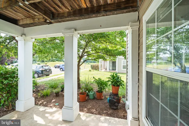 a view of a porch with garden