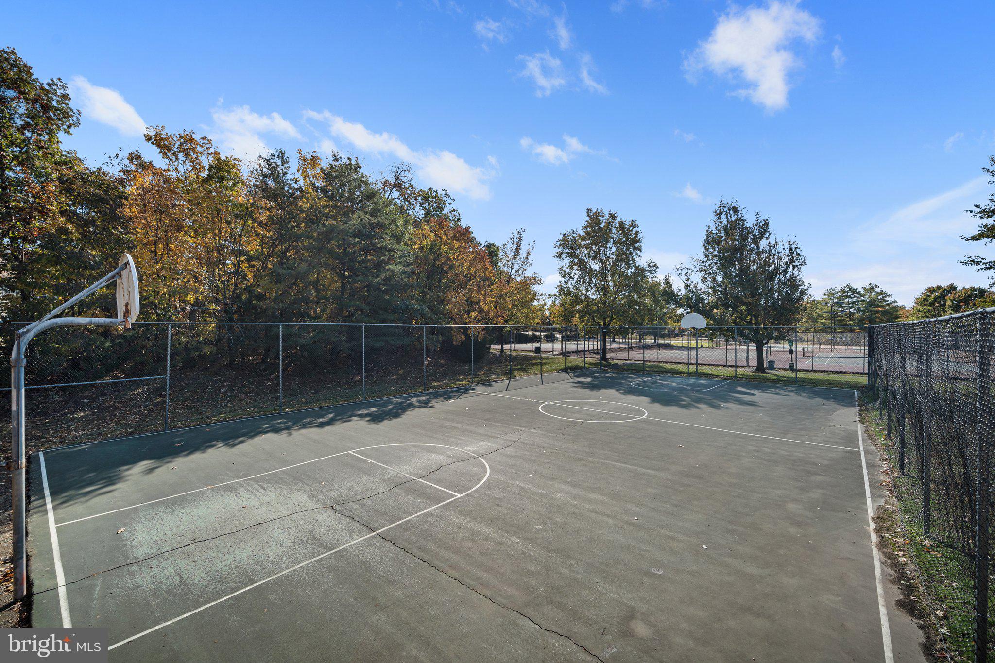 8083 Lacy Drive, Unit 101 Manassas, VA 20109 - Photo 30 of 31 a view of a tennis court