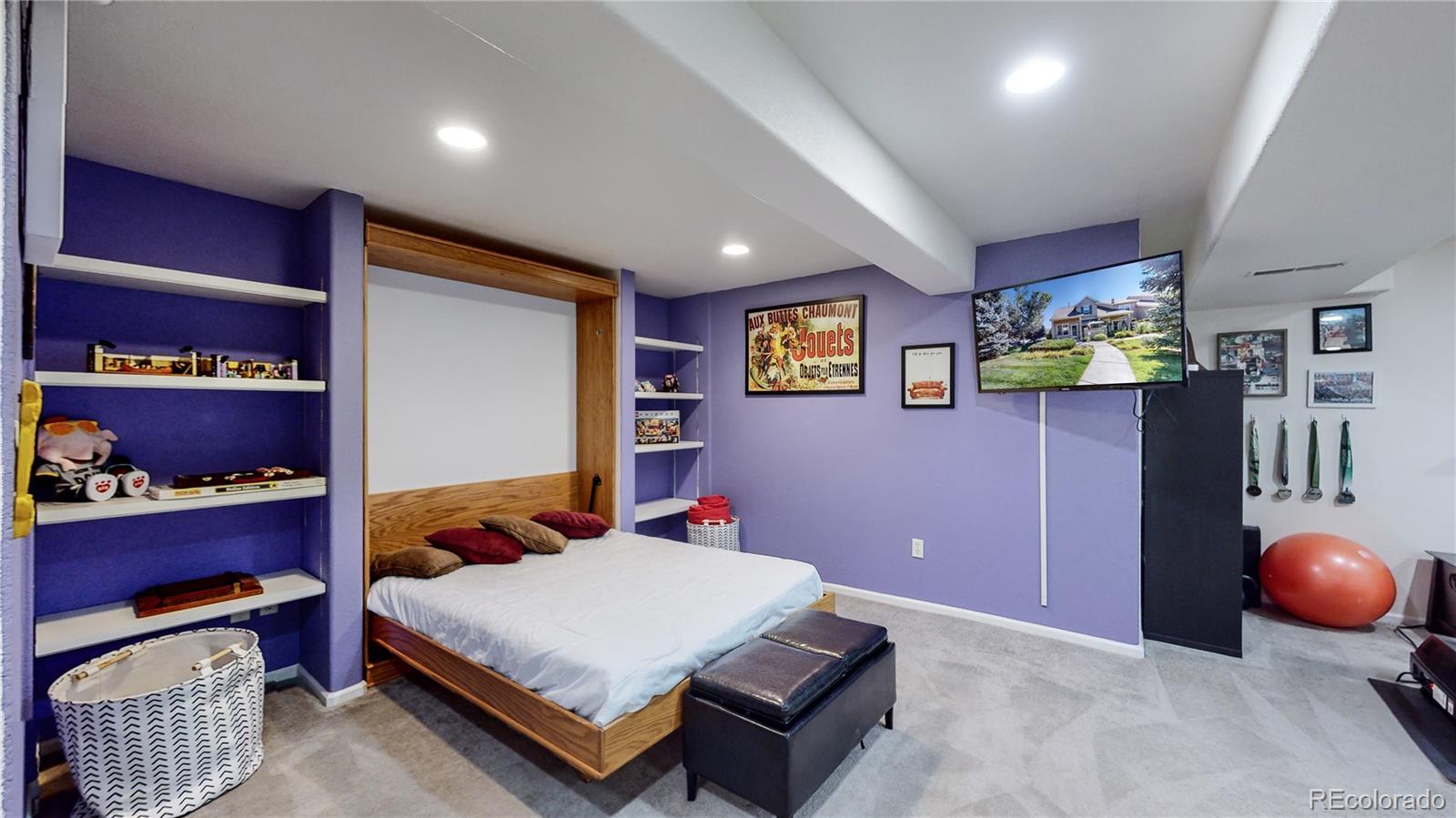 10105 North Grove Loop, Unit A Westminster, CO 80031 - Photo 28 of 40 a bed room with a bed and furniture