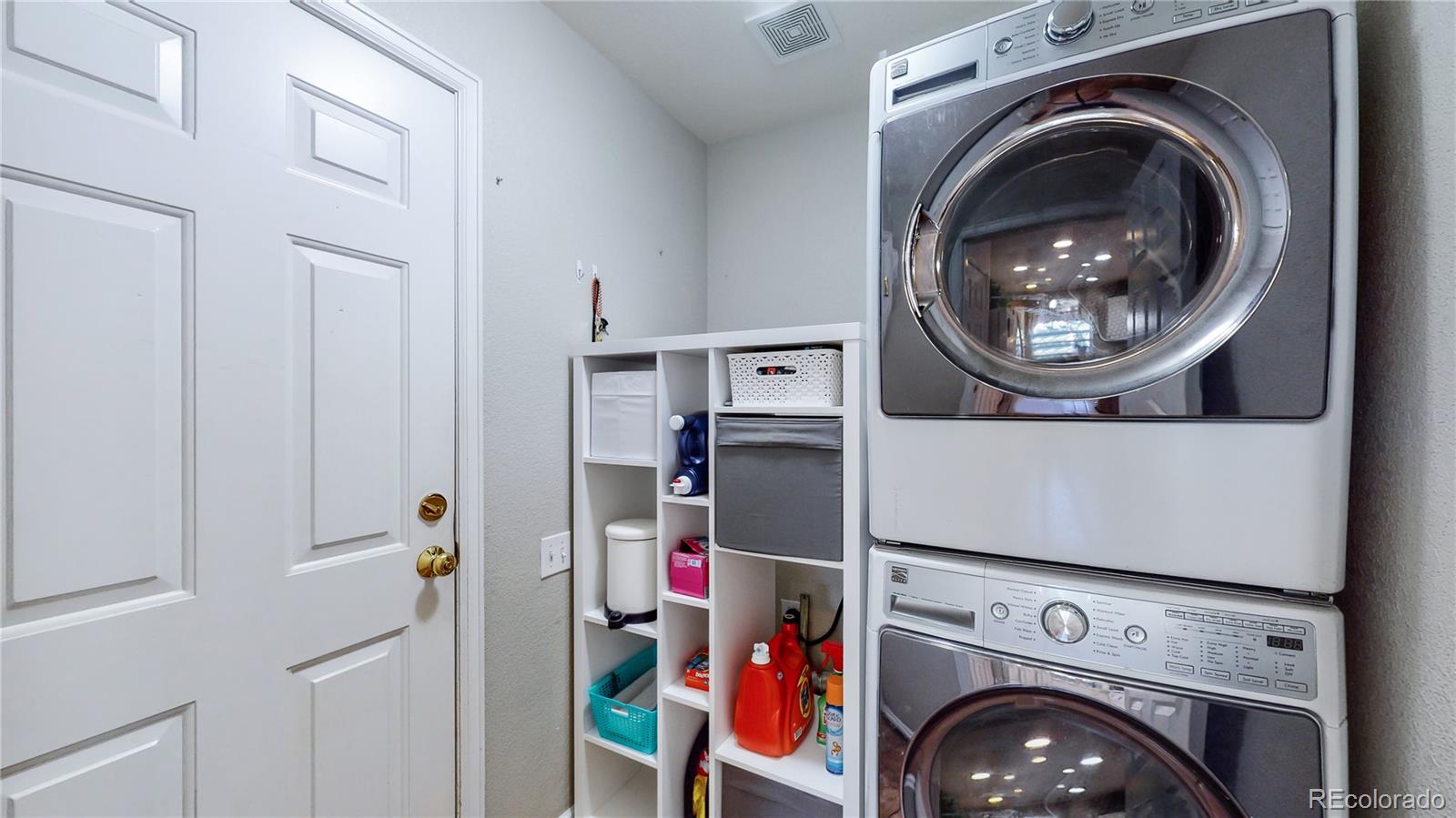 10105 North Grove Loop, Unit A Westminster, CO 80031 - Photo 32 of 40 a utility room with dryer and washer
