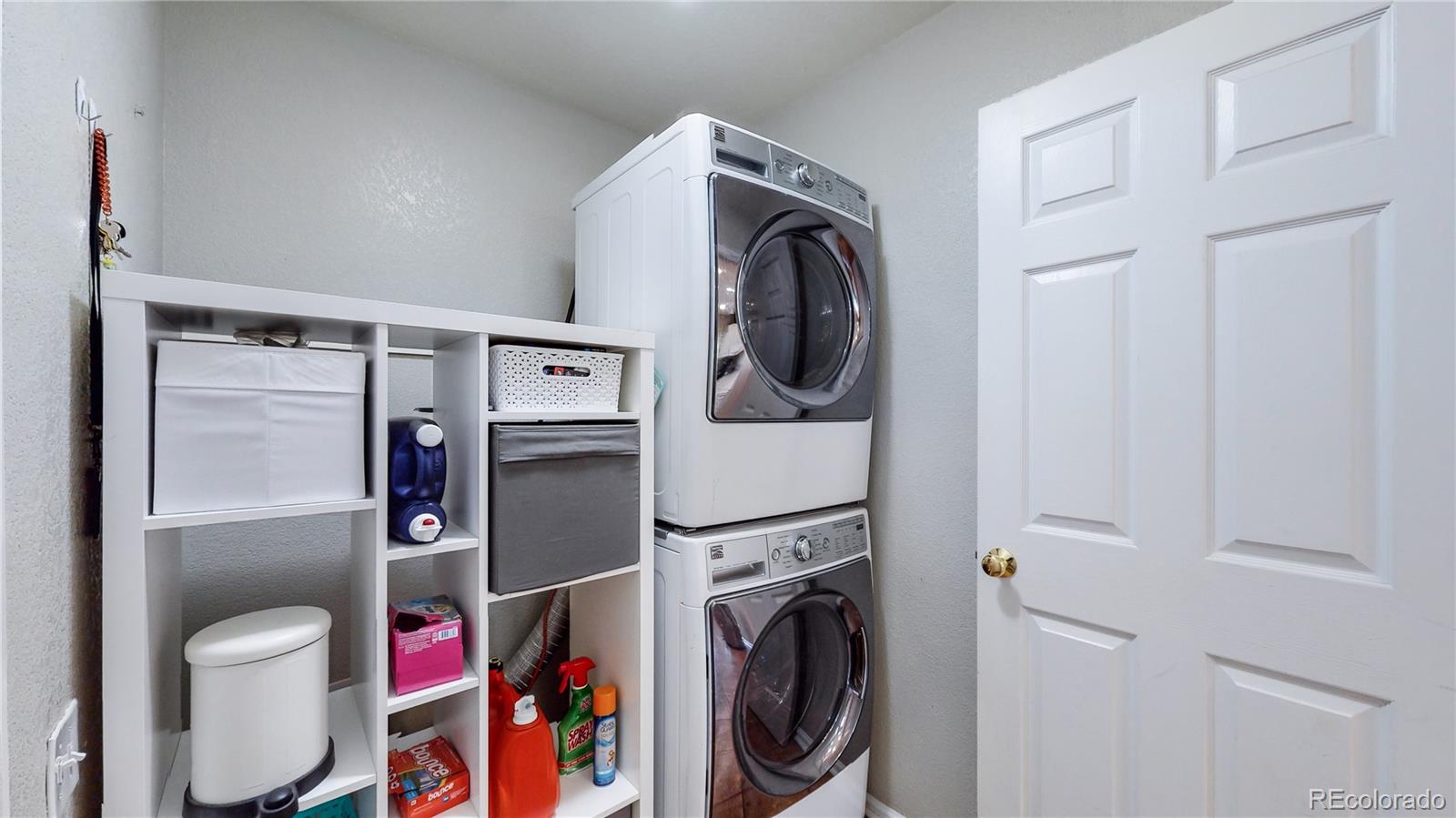 10105 North Grove Loop, Unit A Westminster, CO 80031 - Photo 33 of 40 a utility room with dryer and washer