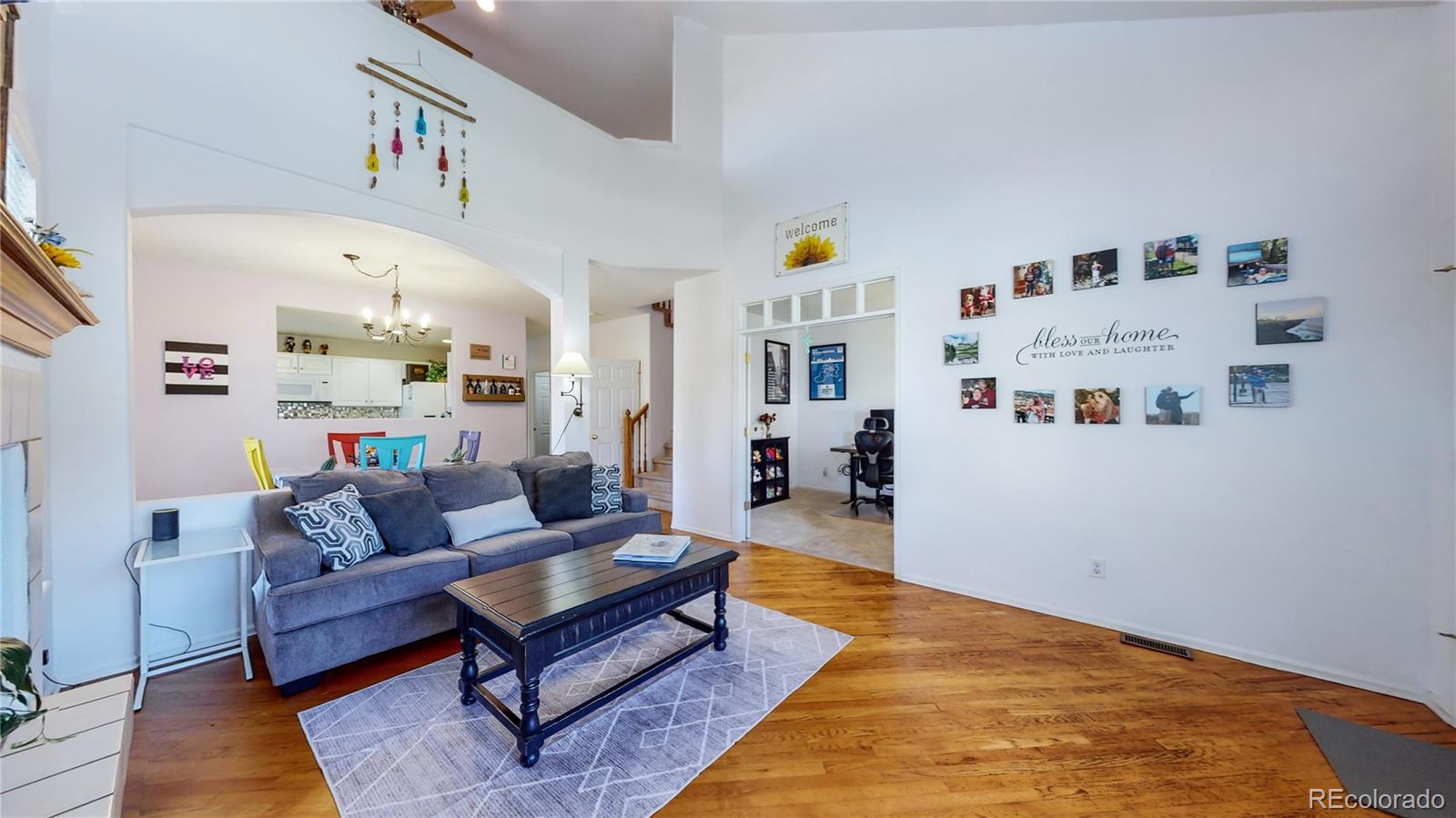 10105 North Grove Loop, Unit A Westminster, CO 80031 - Photo 5 of 40 a living room with furniture and a couch