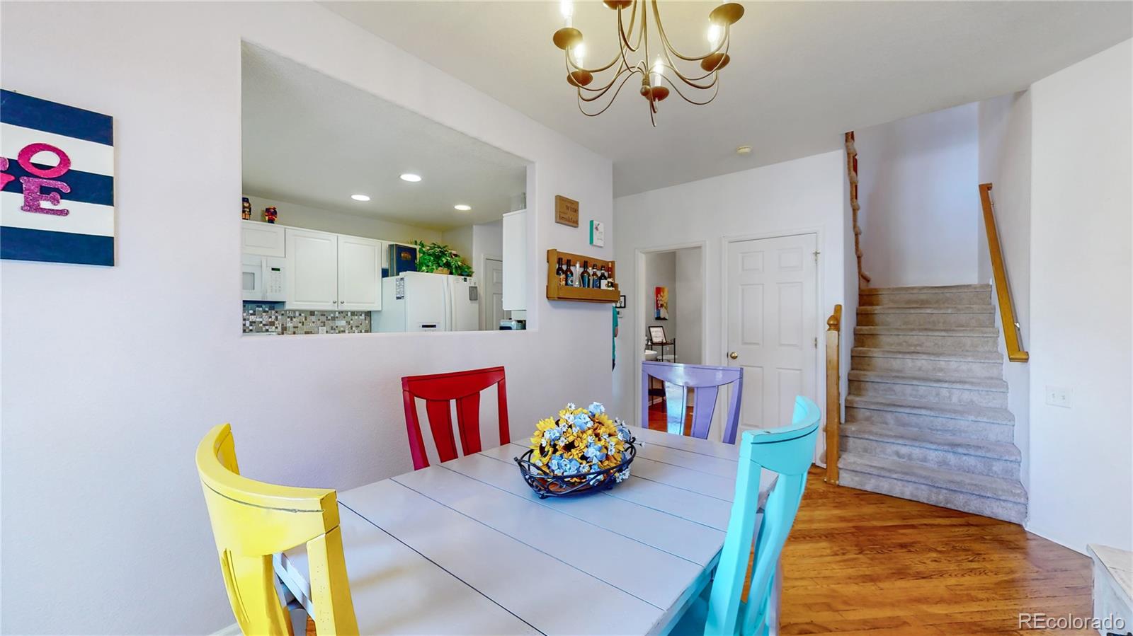 10105 North Grove Loop, Unit A Westminster, CO 80031 - Photo 8 of 40 a view of a dining room with furniture