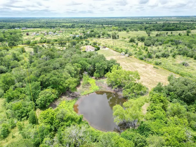 a view of a garden with an outdoor space