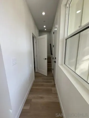a view of empty room with windows