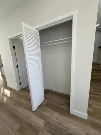 a view of entryway with wooden floor