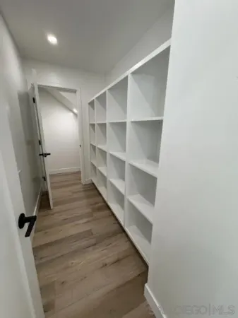 a view of an empty walk in closet