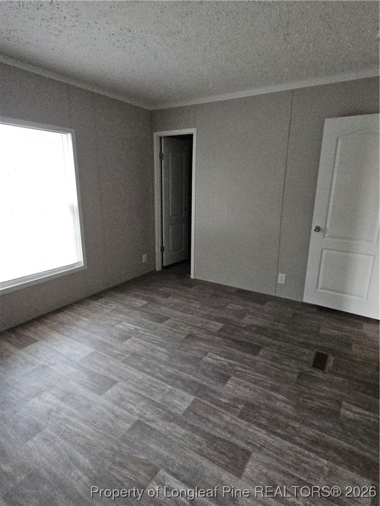 1438 Twisted Hickory Road Elizabethtown, NC 28337 - Photo 14 of 15 a view of an empty room with a window