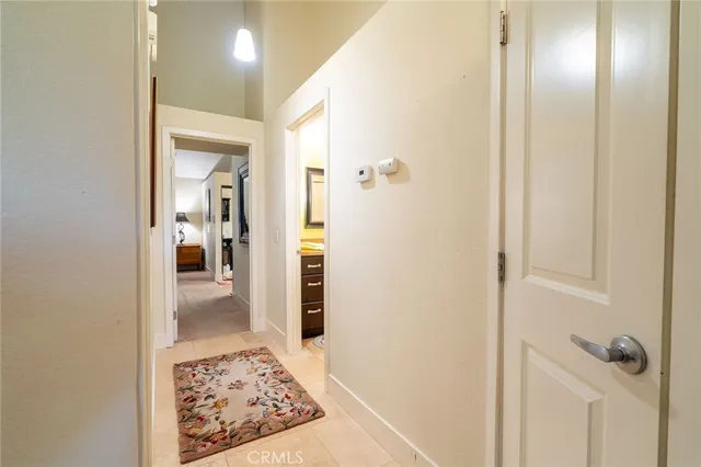 a bathroom with a shower and a door