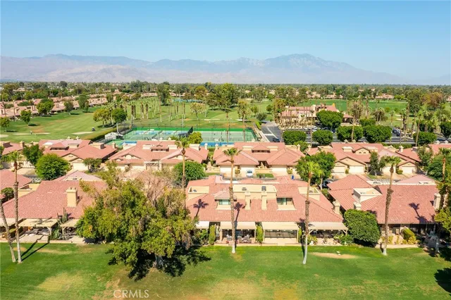 a view of a city with an ocean