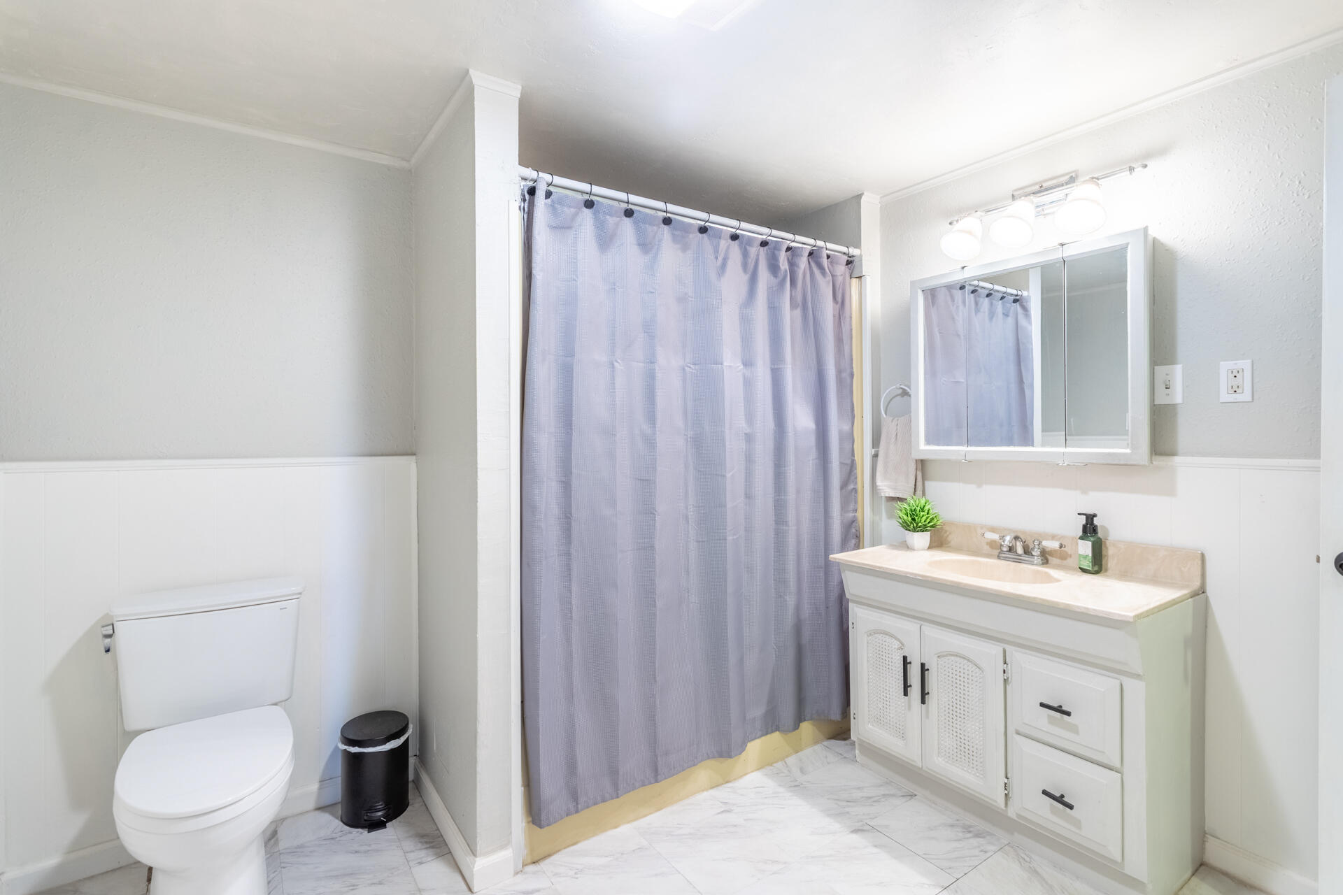 4832 Balls Ferry Road Anderson, CA 96007 - Photo 14 of 51 a bathroom with a double vanity sink toilet and a mirror