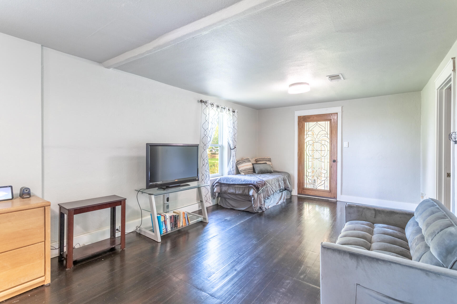 4832 Balls Ferry Road Anderson, CA 96007 - Photo 19 of 51 a living room with furniture and a flat screen tv