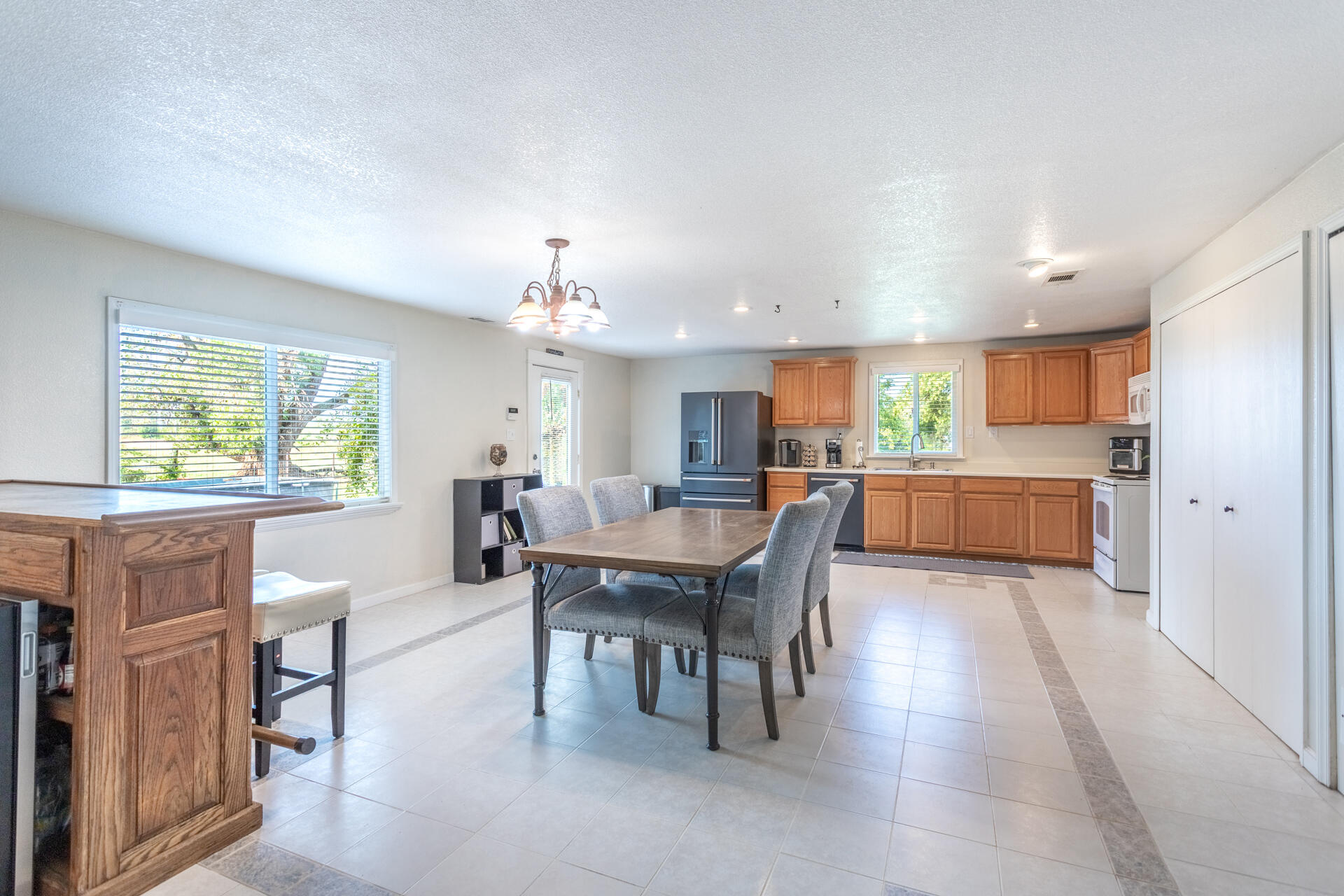 4832 Balls Ferry Road Anderson, CA 96007 - Photo 25 of 51 a view of a dining room with furniture window and wooden floor