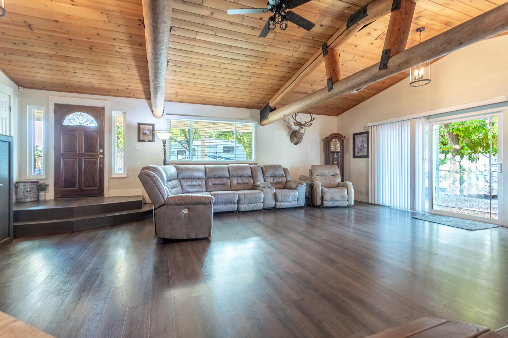 4832 Balls Ferry Road Anderson, CA 96007 - Photo 28 of 51 a living room with furniture and floor to ceiling windows
