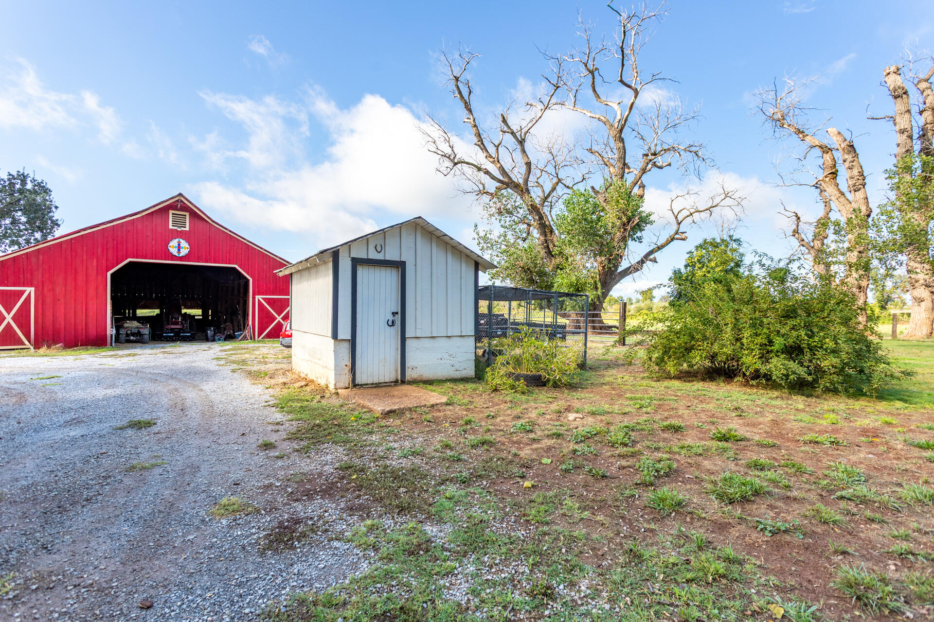4832 Balls Ferry Road Anderson, CA 96007 - Photo 35 of 51 a front view of a house with a yard and garage