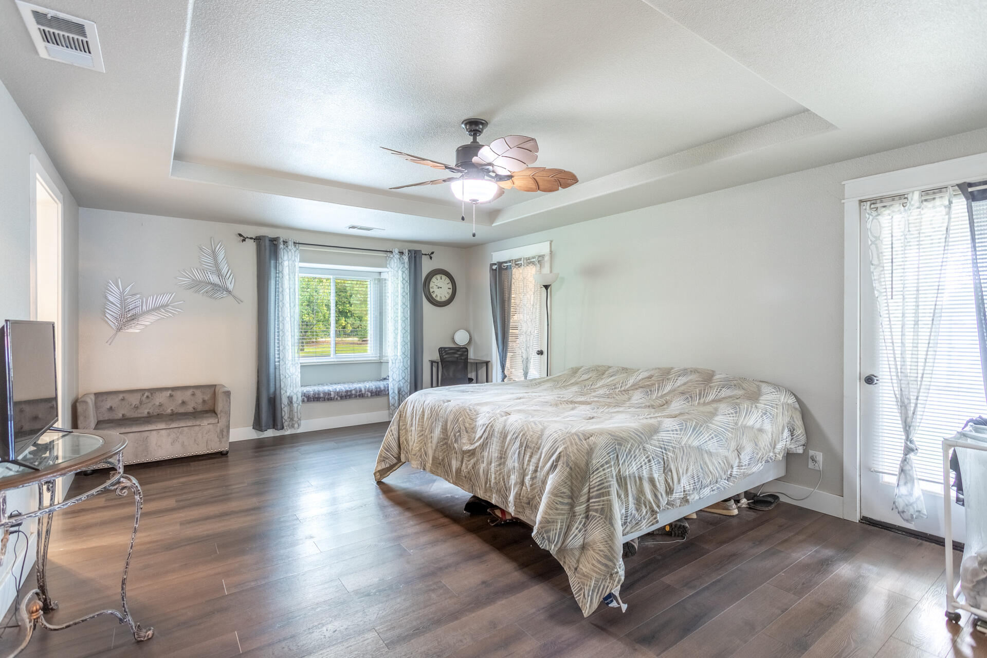 4832 Balls Ferry Road Anderson, CA 96007 - Photo 8 of 51 a bed sitting in a spacious bedroom next to a window