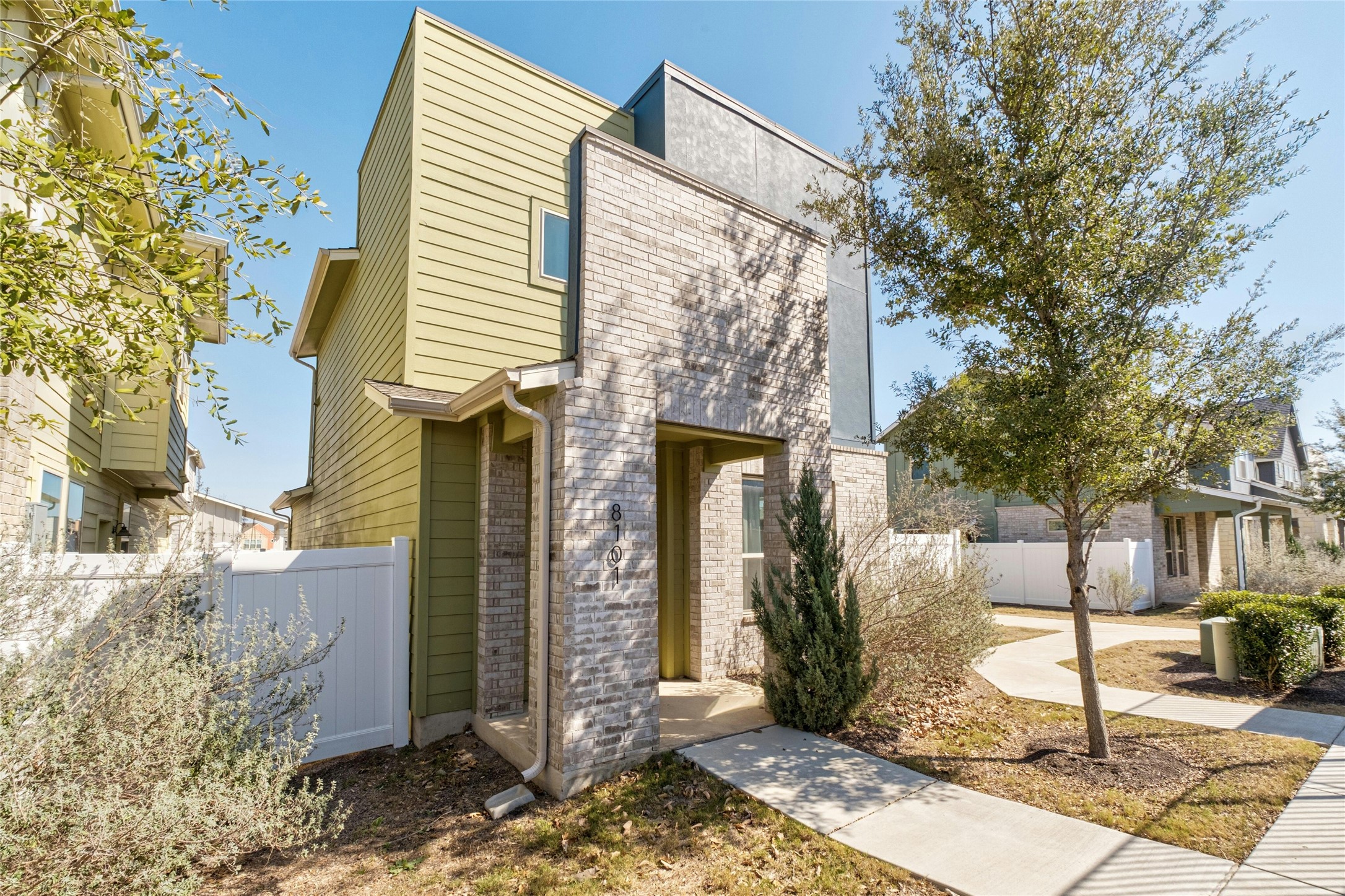 8101 Frida Bend Austin, TX 78744 - Photo 2 of 30 View of front of home featuring brick siding