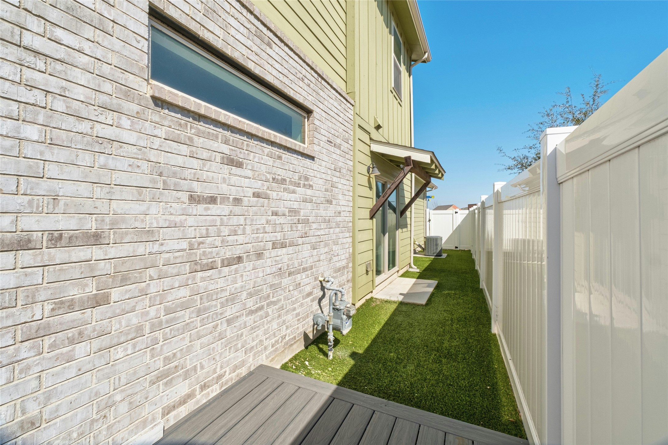 8101 Frida Bend Austin, TX 78744 - Photo 26 of 30 Fenced backyard featuring a wooden deck