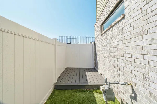 a view of backyard with green space