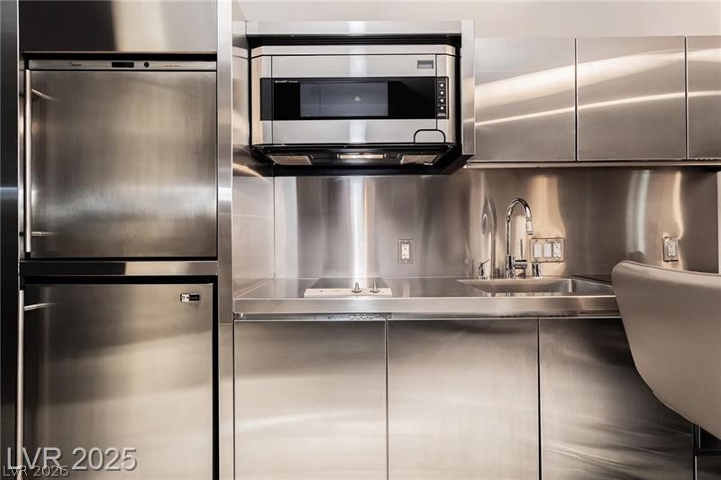 4381 West Flamingo Road, Unit 1809 Las Vegas, NV 89103 - Photo 5 of 11 Detailed view of stainless steel counters and built in appliances