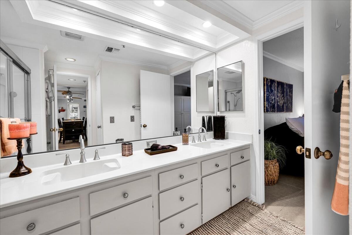 2700 Lawrence Crossley Road, Unit 83 Palm Springs, CA 92264 - Photo 21 of 52 a bathroom with double sink and a mirror