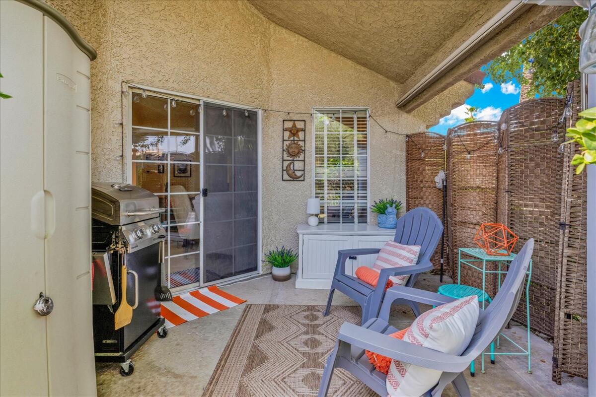 2700 Lawrence Crossley Road, Unit 83 Palm Springs, CA 92264 - Photo 27 of 52 a building outdoor space with patio furniture
