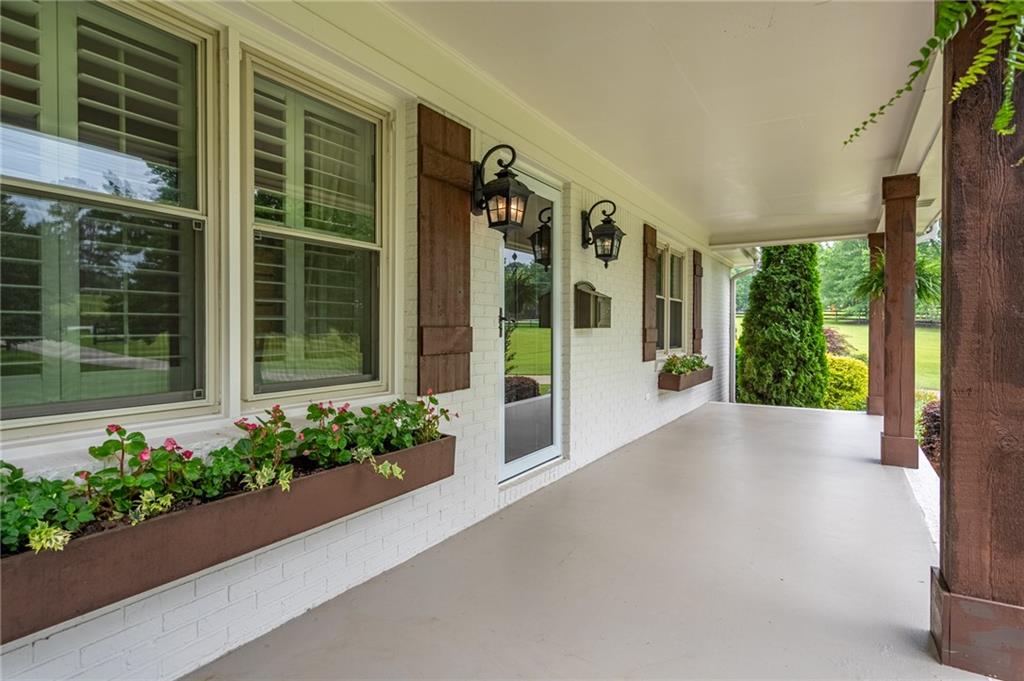 4067 Mason Creek Road Winston, GA 30187 - Photo 19 of 48 a view of a garden with a flower plants