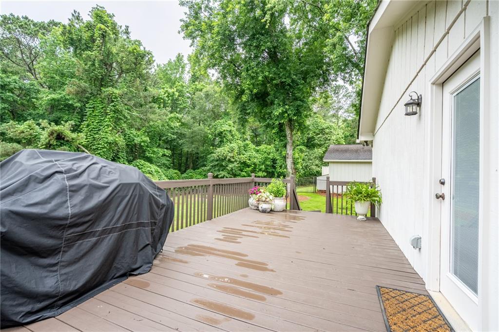 4067 Mason Creek Road Winston, GA 30187 - Photo 23 of 48 a view of a backyard with sitting area