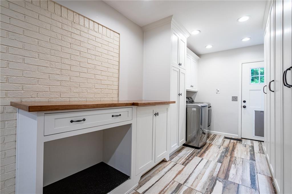 4067 Mason Creek Road Winston, GA 30187 - Photo 8 of 48 a view of a hallway with washer and dryer