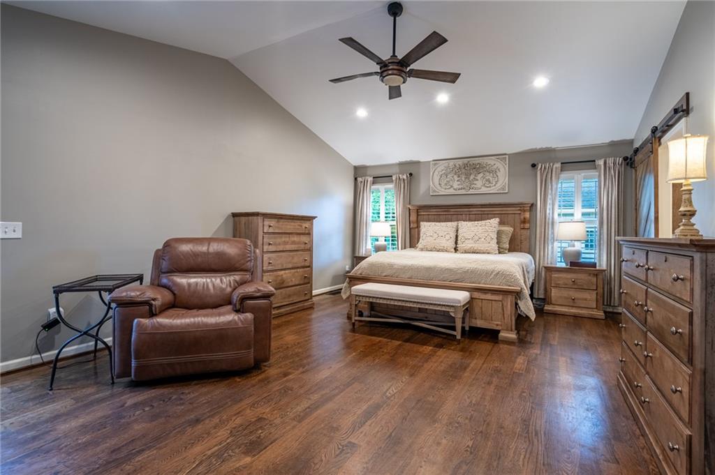 4067 Mason Creek Road Winston, GA 30187 - Photo 9 of 48 a bedroom with a bed furniture and wooden floor
