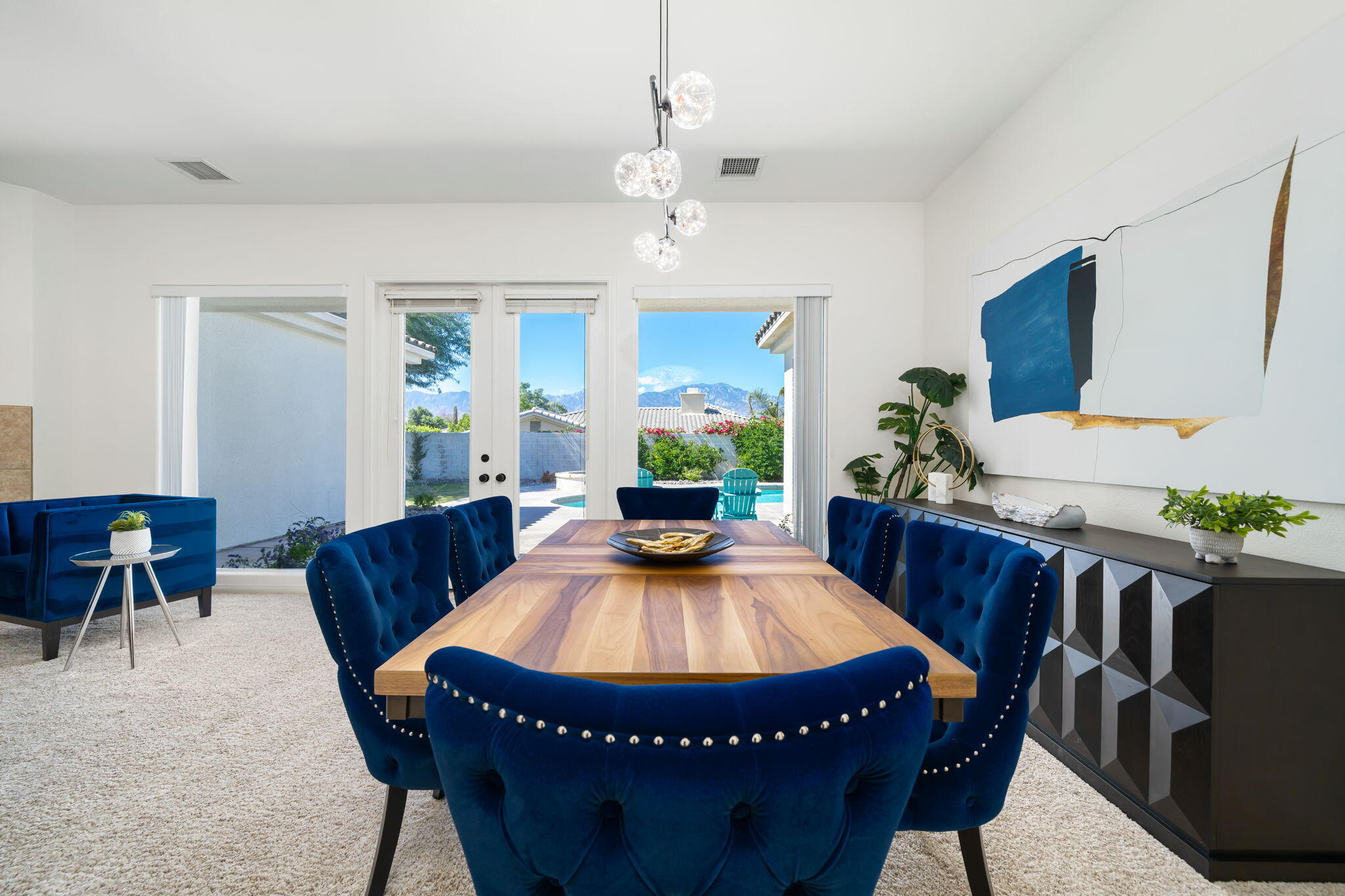 1 Waterloo Court Rancho Mirage, CA 92270 - Photo 12 of 54 a living room with furniture and a table