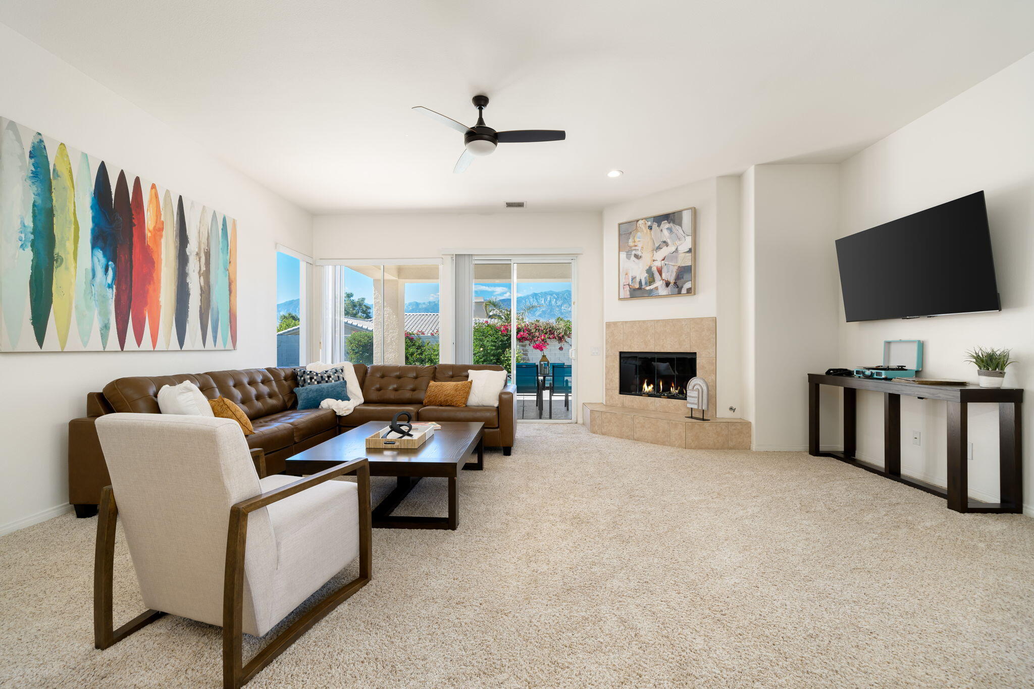 1 Waterloo Court Rancho Mirage, CA 92270 - Photo 16 of 54 a living room with furniture and a flat screen tv