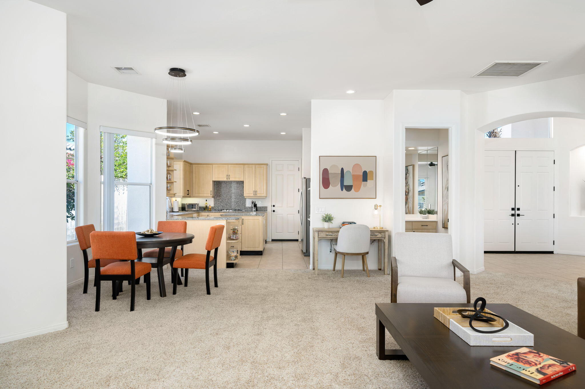 1 Waterloo Court Rancho Mirage, CA 92270 - Photo 23 of 54 a living room with furniture kitchen view and a dining table