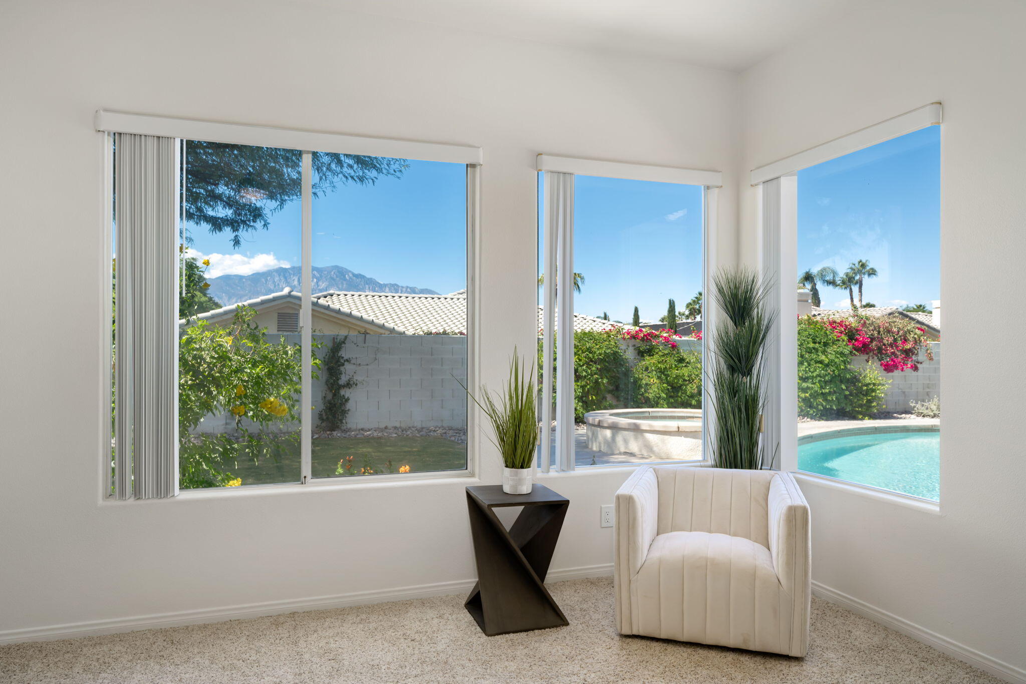 1 Waterloo Court Rancho Mirage, CA 92270 - Photo 34 of 54 a living room with furniture and a window