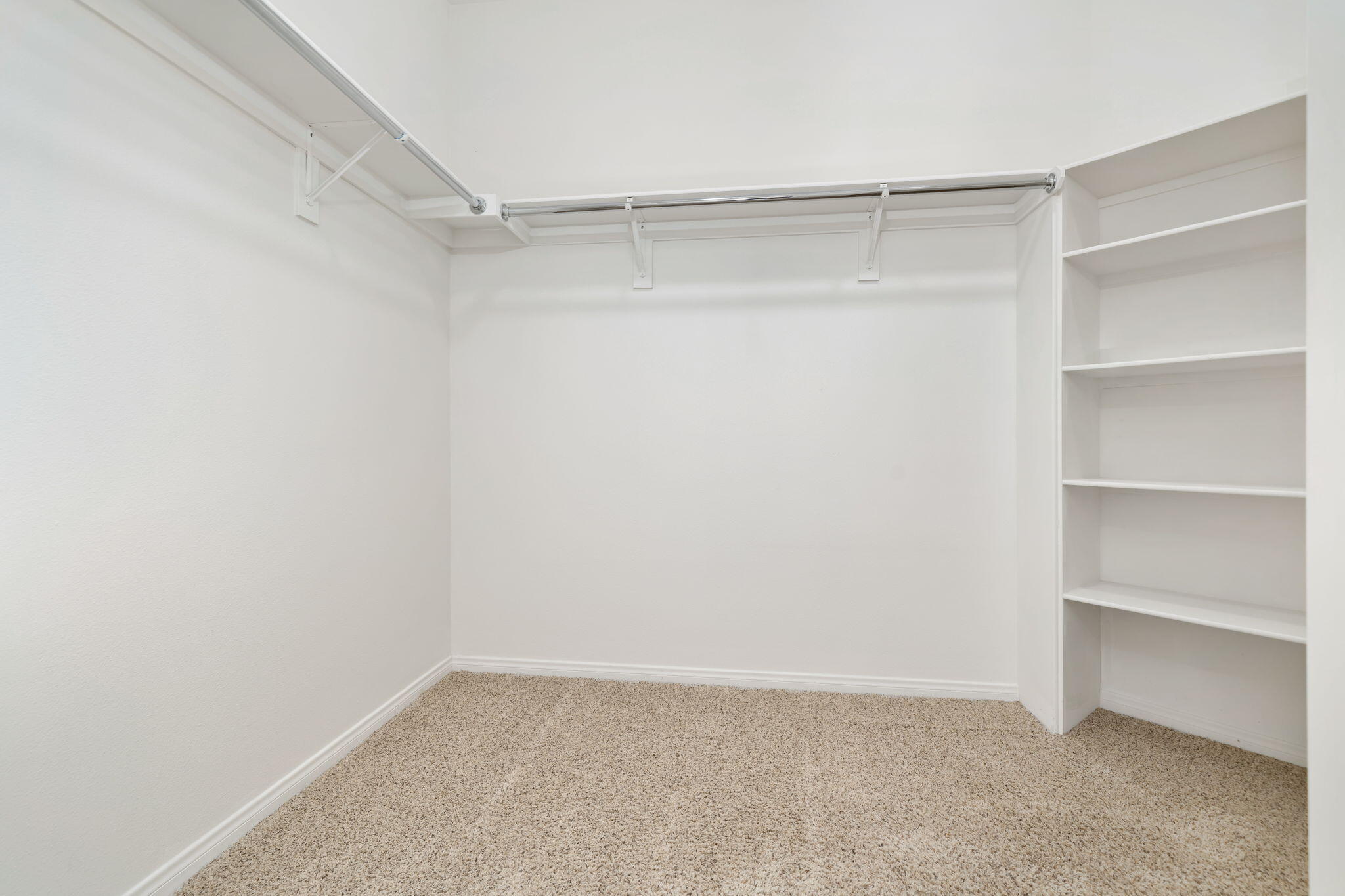 1 Waterloo Court Rancho Mirage, CA 92270 - Photo 38 of 54 a view of an empty walk in closet