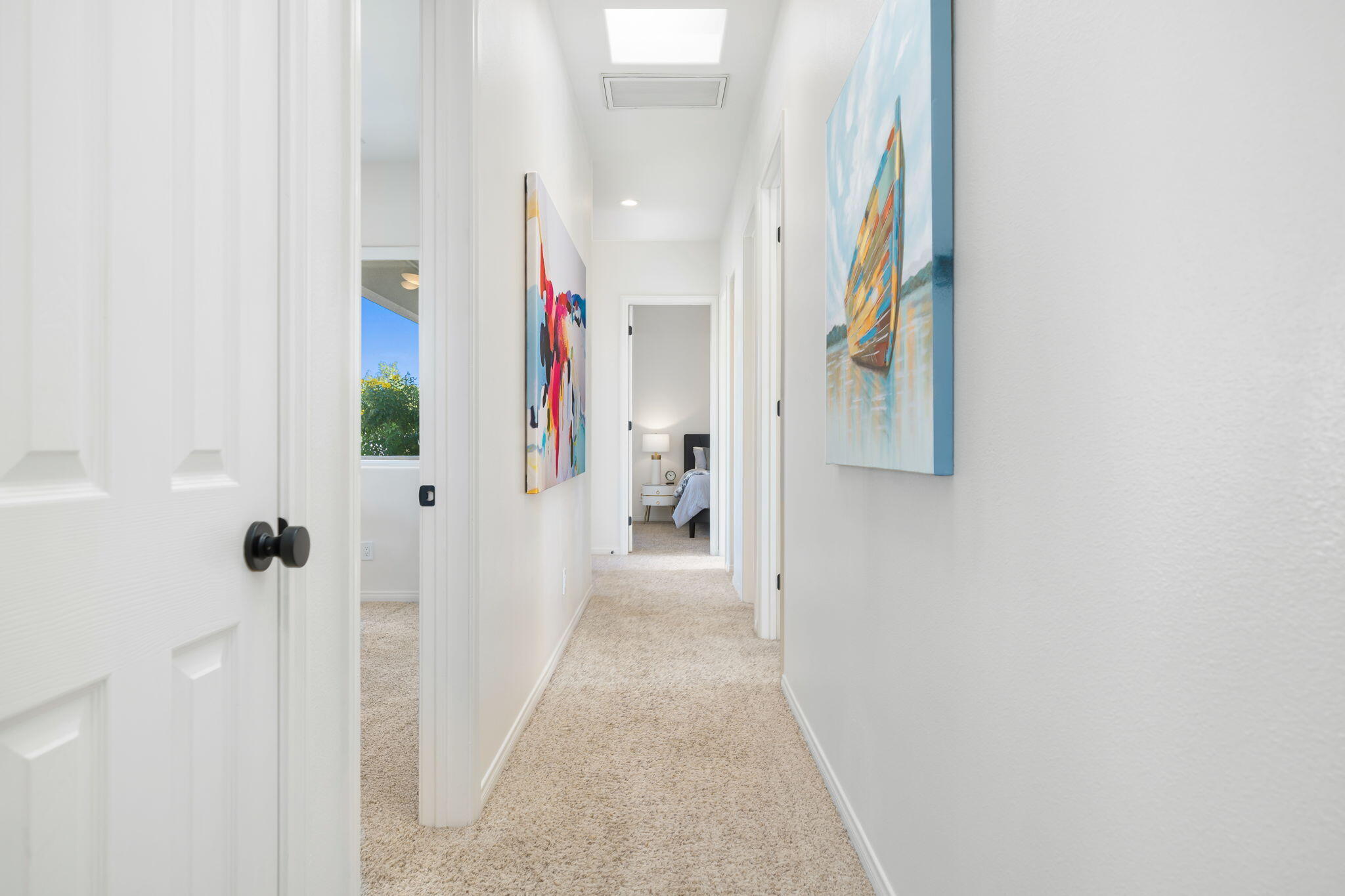 1 Waterloo Court Rancho Mirage, CA 92270 - Photo 39 of 54 a view of a hallway with wooden floor and entryway