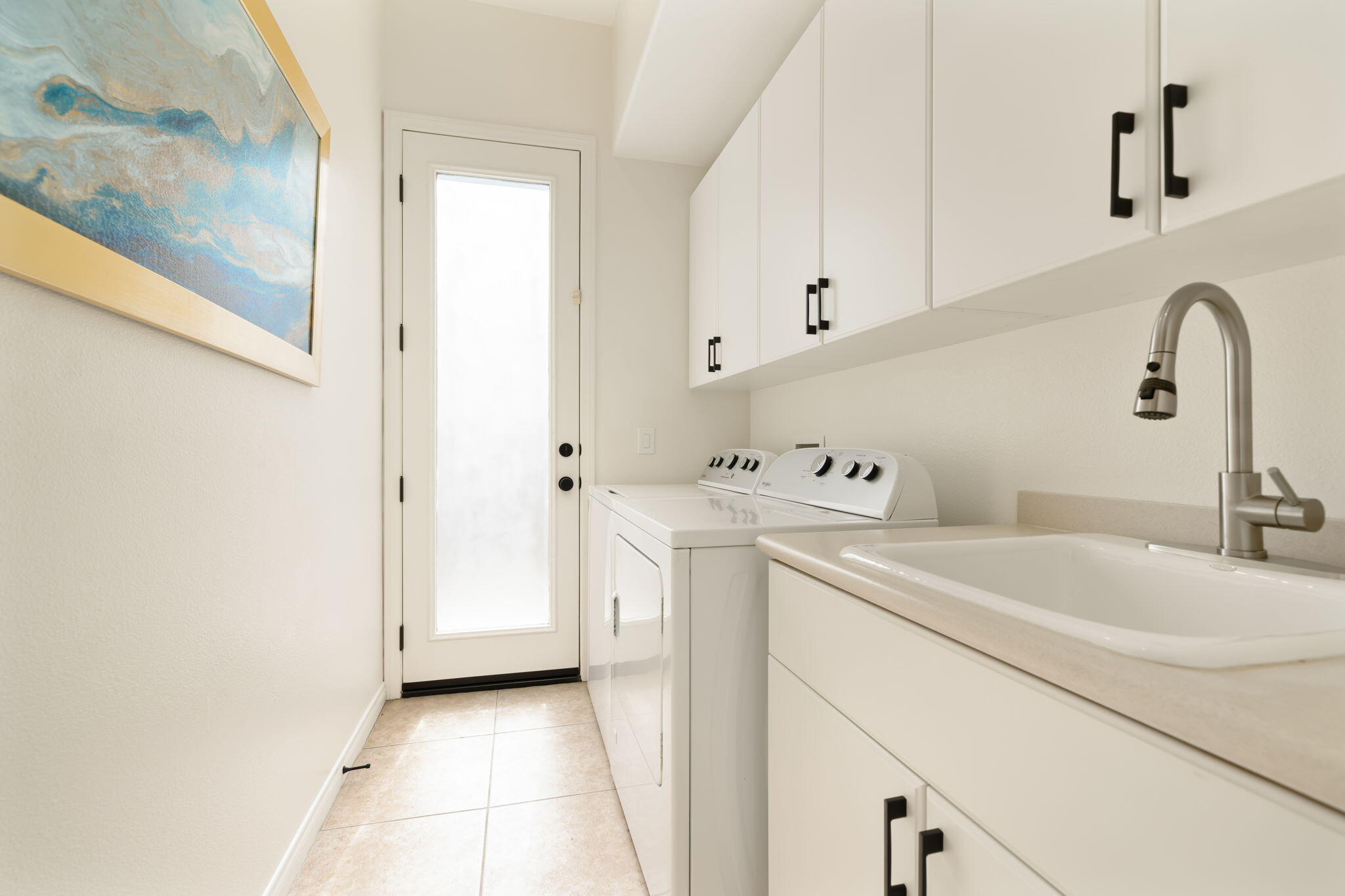 1 Waterloo Court Rancho Mirage, CA 92270 - Photo 44 of 54 a utility room with dryer and washer