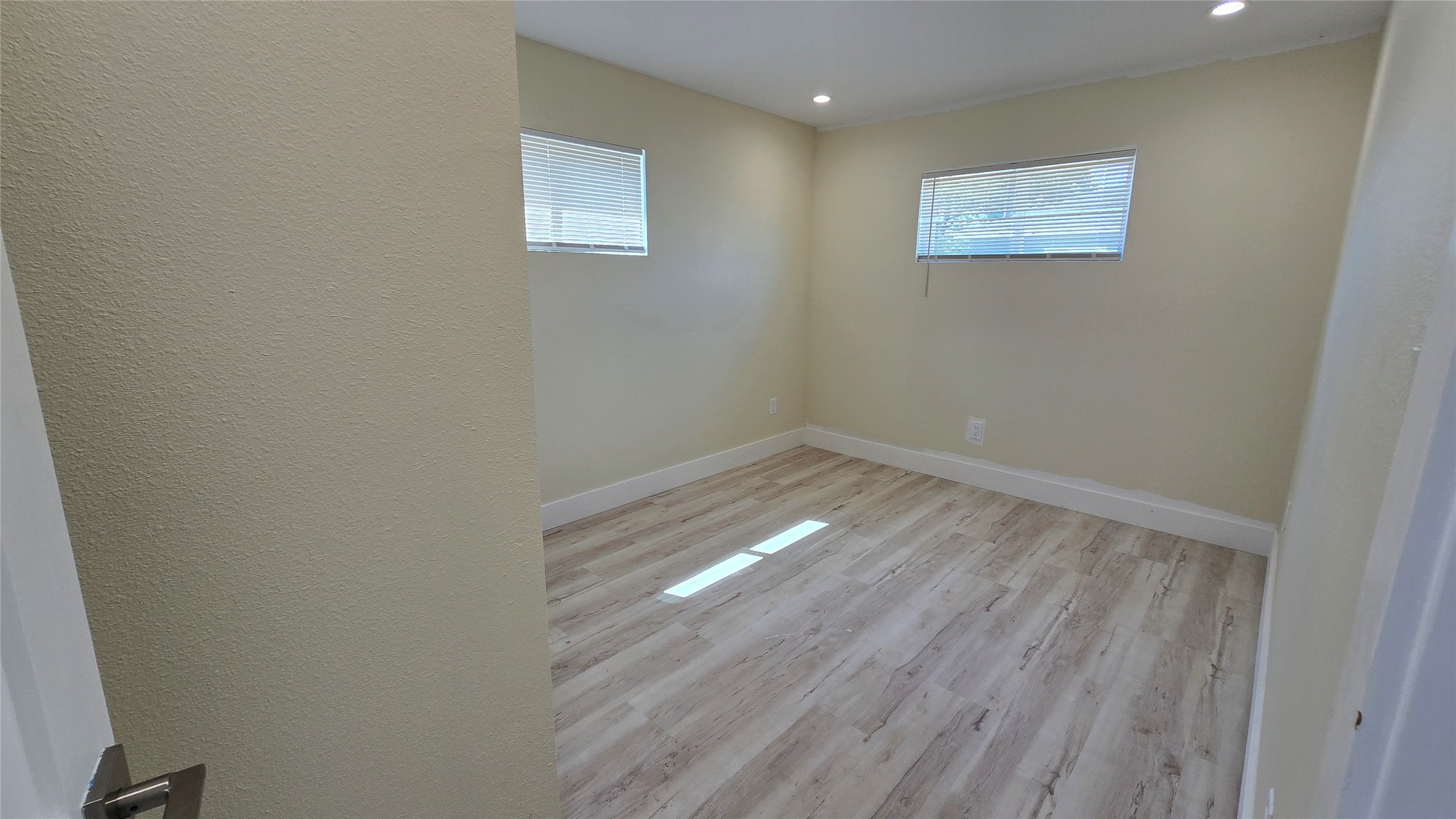 3741 Seabrook Street Houston, TX 77021 - Photo 17 of 50 a view of a small space with wooden floor and a window