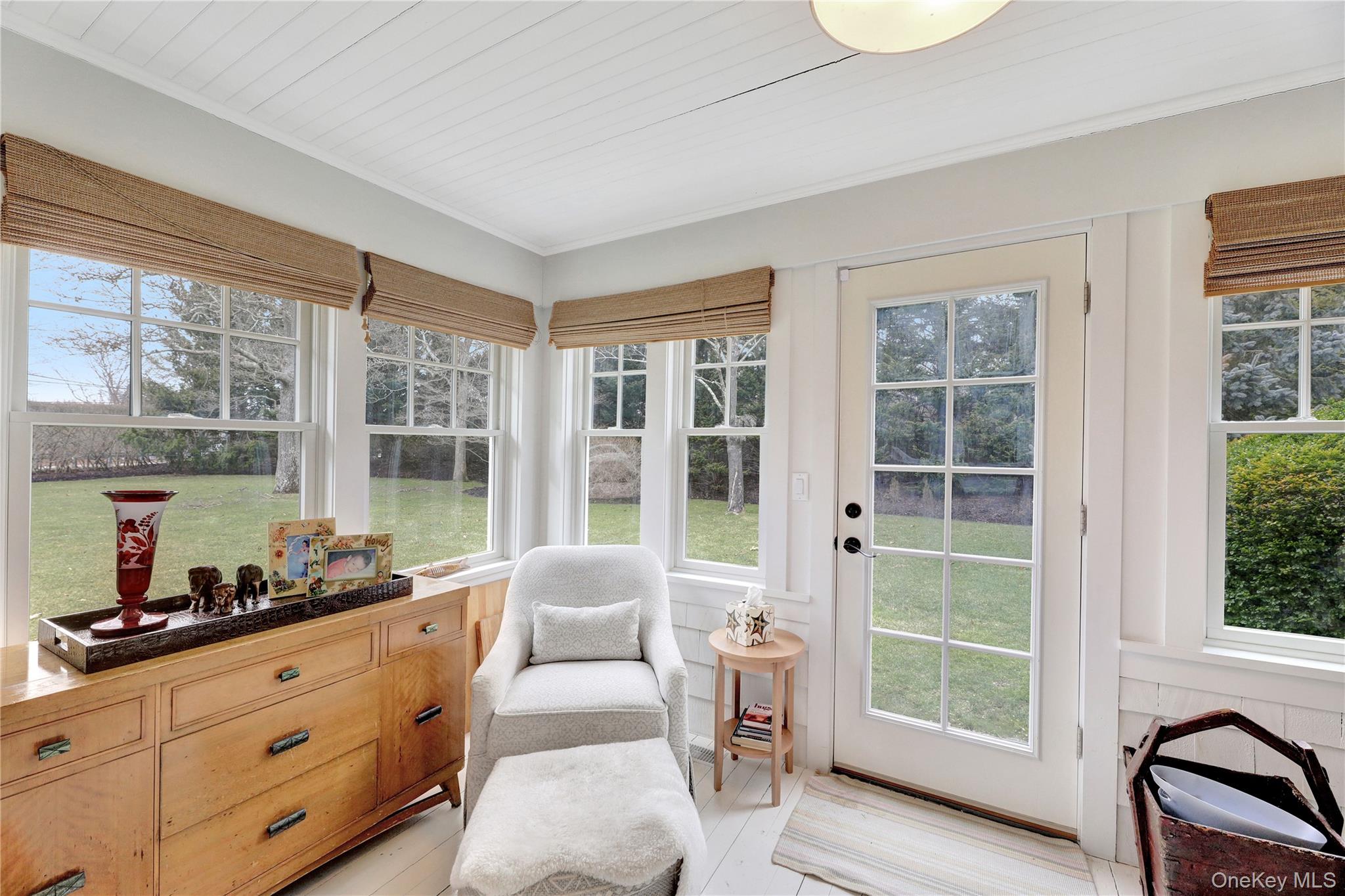 198 South Country Road Remsenburg, NY 11960 - Photo 16 of 49 a living room with furniture and windows